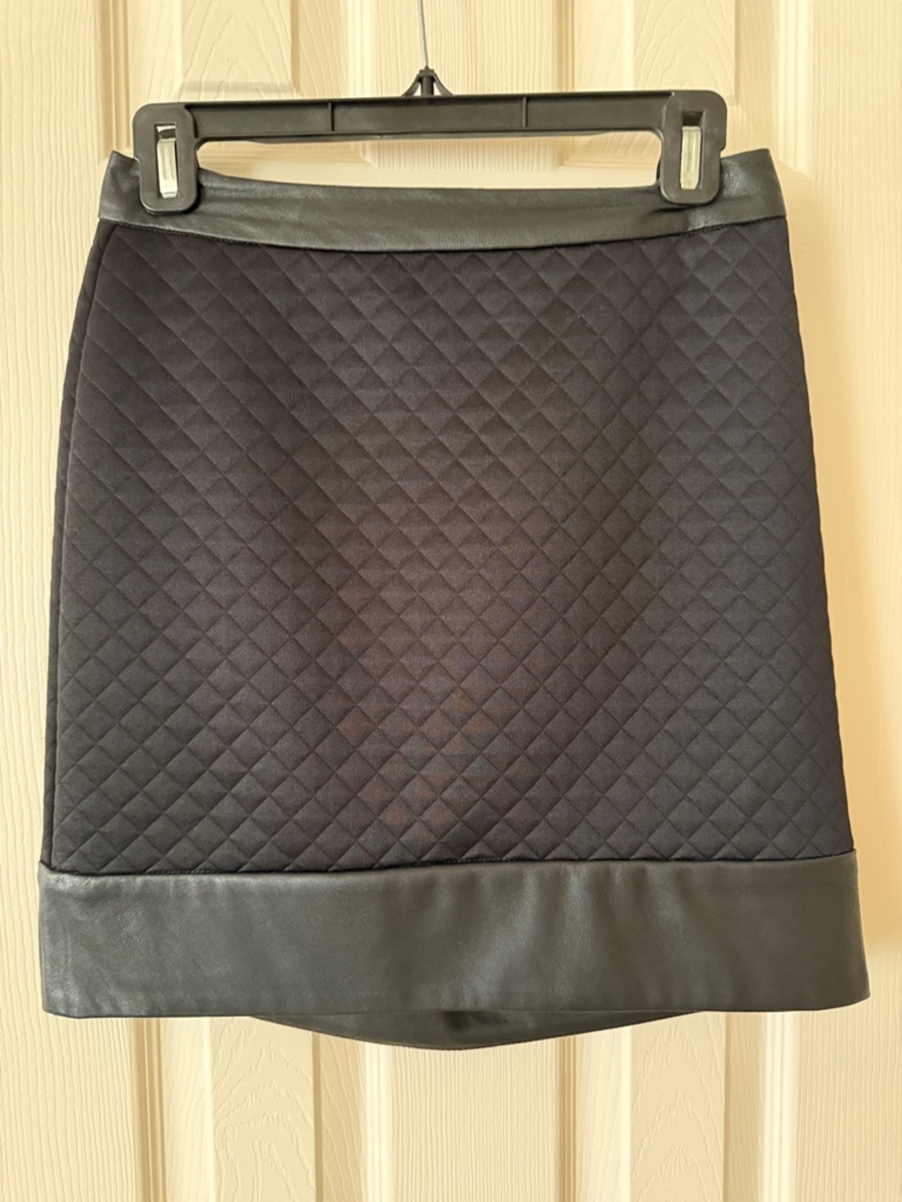 Search for Sanity Black Quilted Mini Skirt with Faux Leather Trim